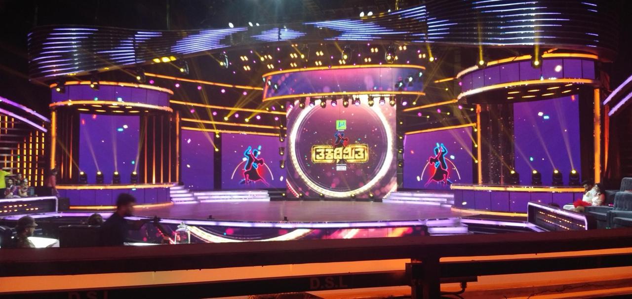 Television dance show set with elaborate LED stage design, circular truss, and broadcast-grade lighting for Kannada TV