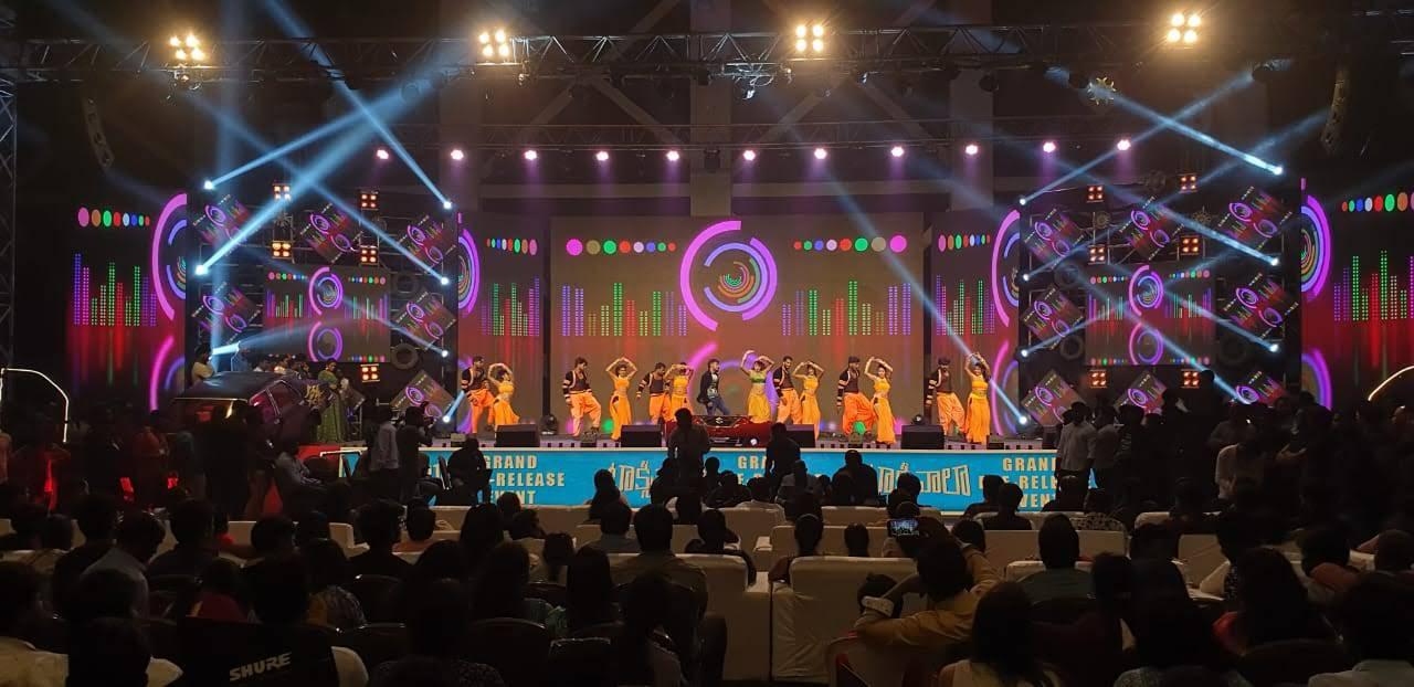 Kannada film grand release event with LED wall, moving head lights, and live dance performance in Bangalore