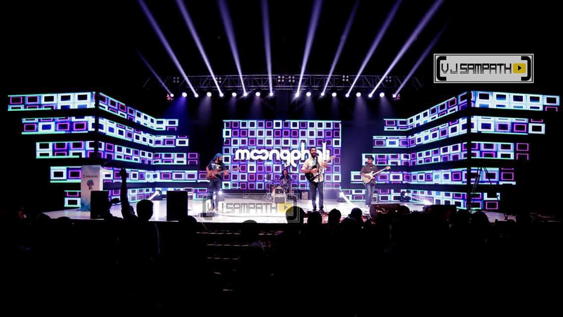 Live band concert stage setup with LED panel backdrop and concert-grade beam lighting in Bangalore