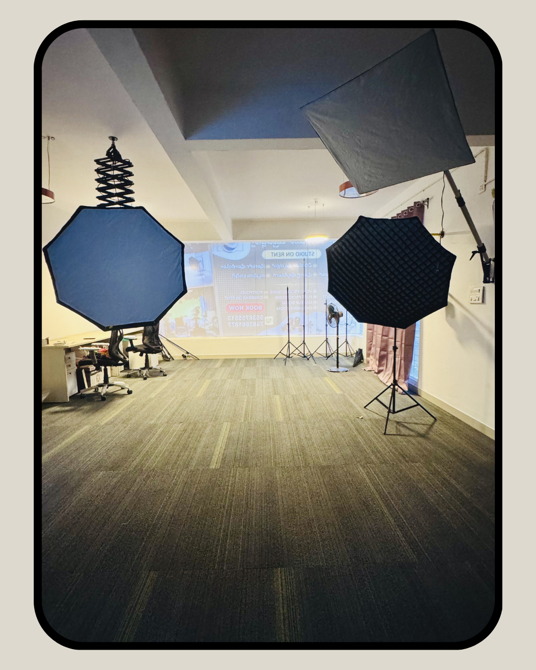 Professional studio with softbox lighting rigs and LED backdrop screen at Supreme Media Productions Vidyaranyapura Bengaluru