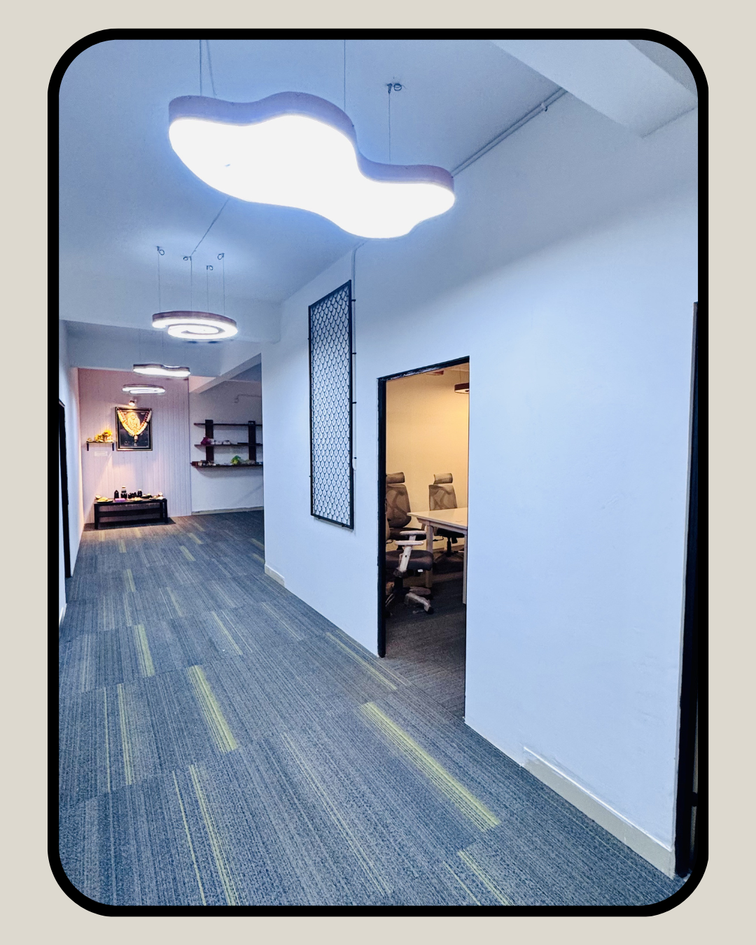 Modern office corridor with designer lighting and workspace cabins at SMP production facility Bangalore