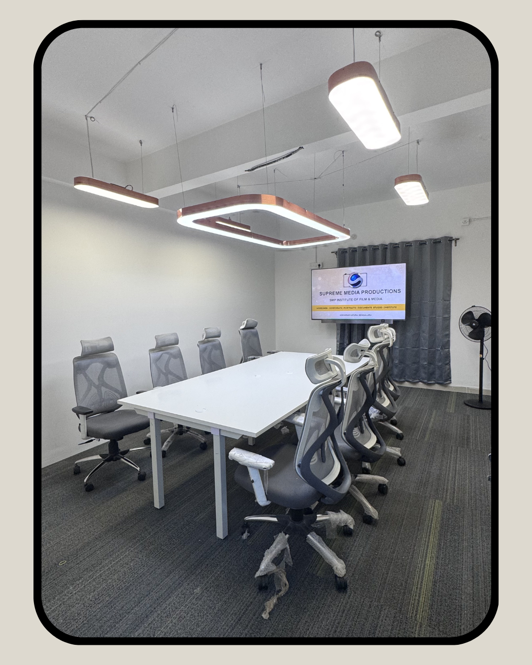 Modern conference and client meeting room with display screen at Supreme Media Productions Vidyaranyapura